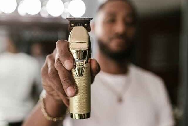man holding a trimmer