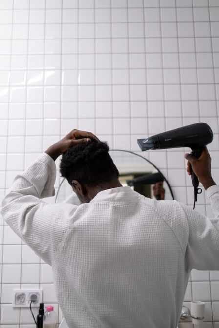 A man using best blow dryers for beards